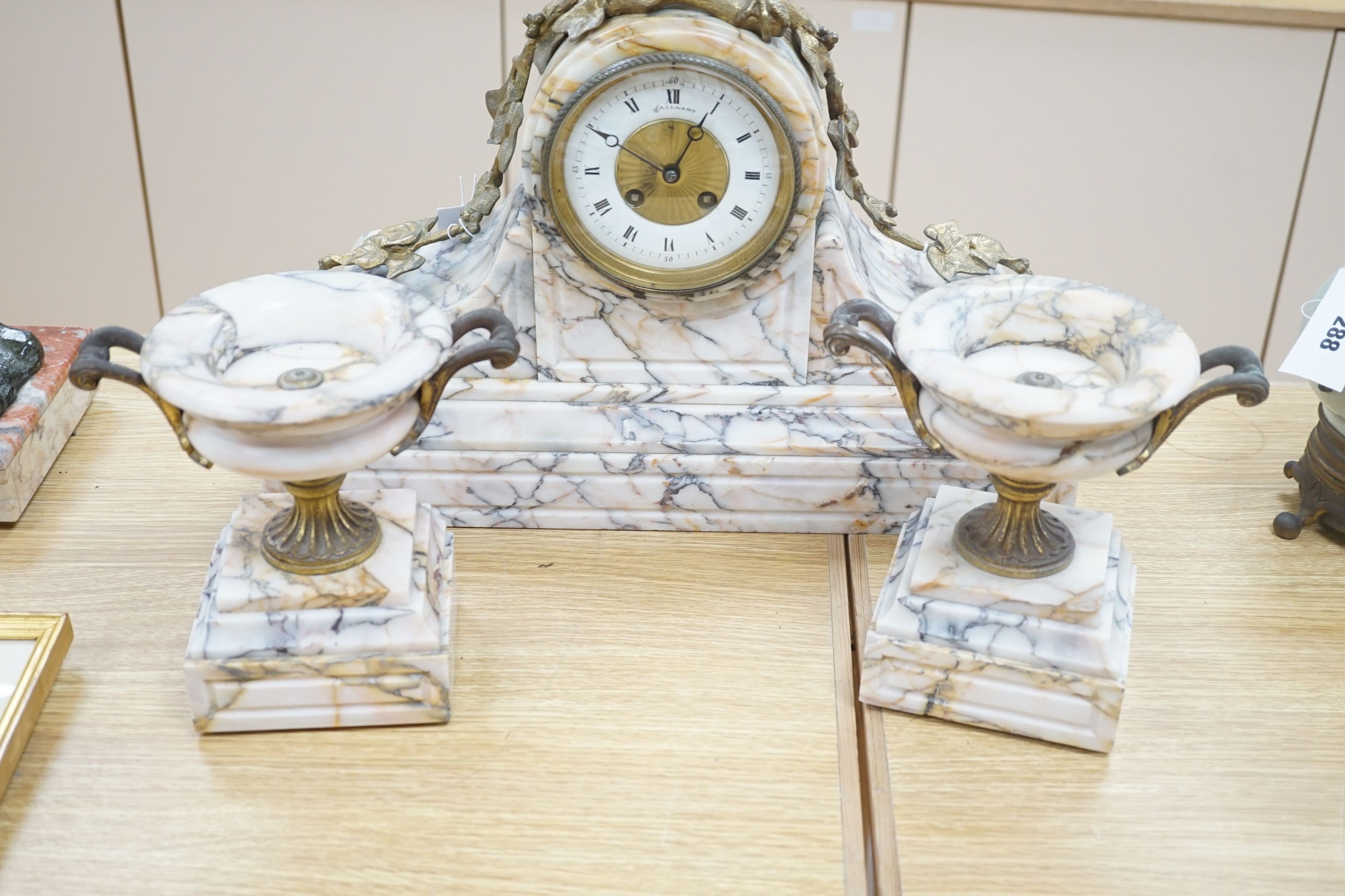 A late 19th century French marble clock garniture with bronze eagle, signed by J Moignier, height 51cm